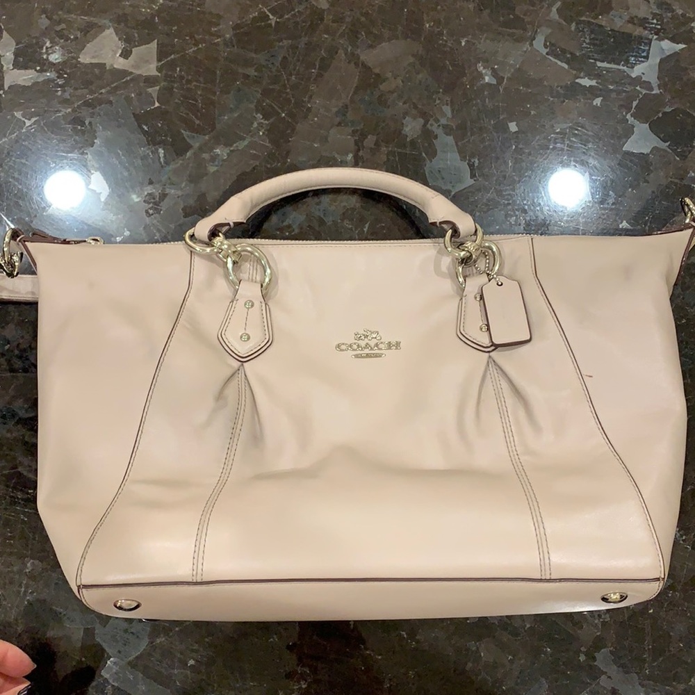Grey/beige leather Coach hobo bag with hand and remover shoulder straps.